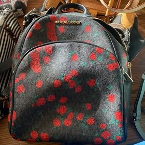 Michael Kors rose backpack gently used